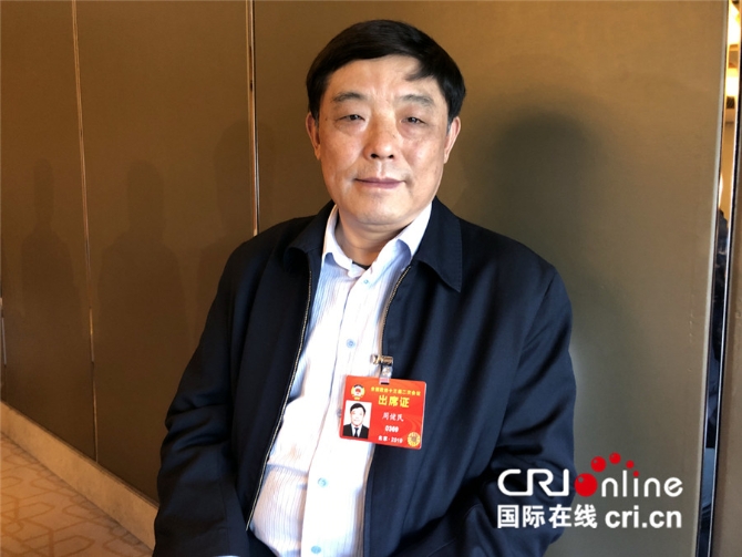 图片默认标题_fororder_全国政协委员周健民周建民 摄影:孙清